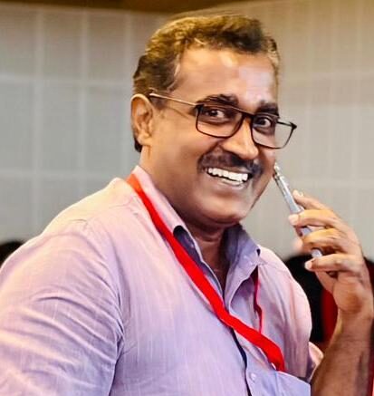 R K Binu